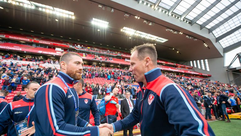 Picture by Allan McKenzie/SWpix.com - 26/05/2019 - Rugby League - Dacia Magic Weekend 2019 - St Helens v Castleford Tigers - Anfield, Liverpool, England - St Helens's coach Justin Holbrook shakes hands with Kyle Amor after victory over Castleford.