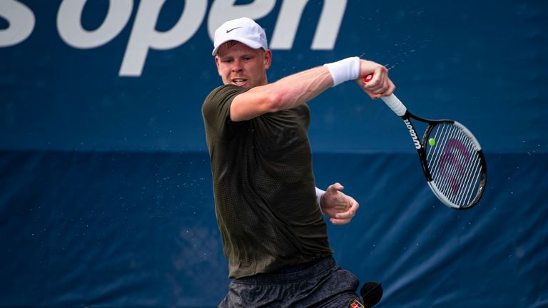 Kyle Edmund of Great Britain practices with his coach, Mark Hilton and physio, Ian Prangley, before the start of the US Open at the USTA Billie Jean King National Tennis Center on August 21, 2019 in New York City.