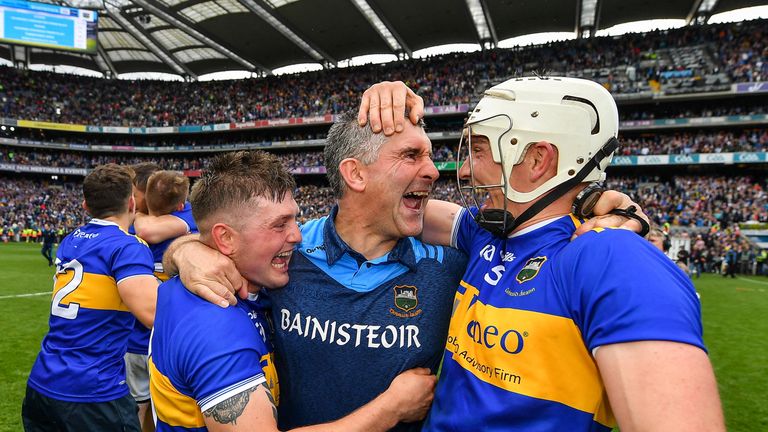 Liam Sheedy celebrates with Willie Connors and Brendan Maher at full-time