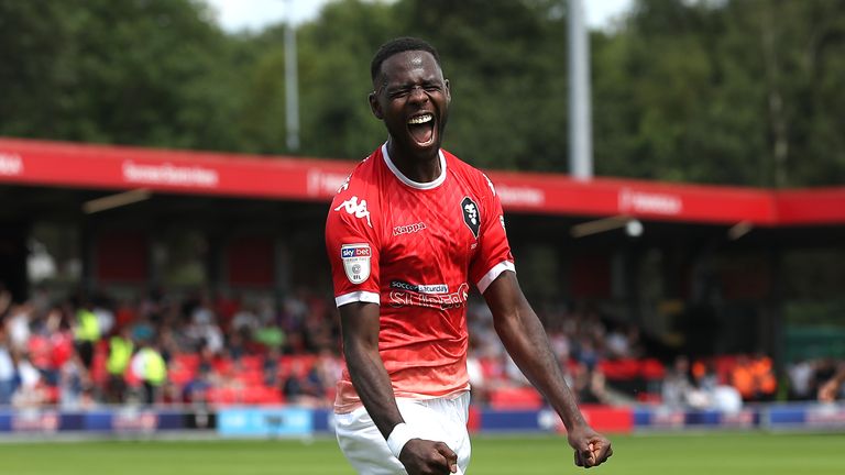 Salford City's Mani Dieseruvwe celebrates scoring his side's second goal of the game during the Sky Bet League Two match at the Peninsula Stadium, Salford. PRESS ASSOCIATION Photo. Picture date: Saturday August 3, 2019. Photo credit should read: Martin Rickett/PA Wire. RESTRICTIONS: EDITORIAL USE ONLY No use with unauthorised audio, video, data, fixture lists, club/league logos or "live" services. Online in-match use limited to 120 images, no video emulation. No use in betting, games or single club/league/player publications.