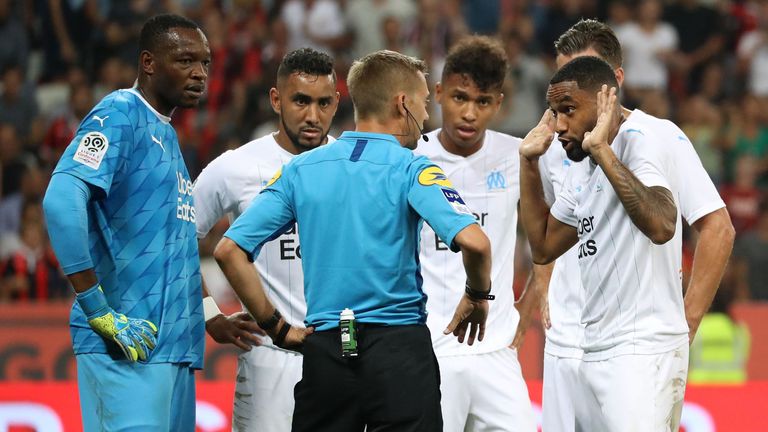 Referee Clement Turpin interrupted the game midway through the first- half at the Allianz Riviera 