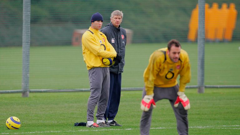 LONDON - DECEMBER 06:  Martin Keown, Arsenal Manager Arsene Wenger look on during the training session before their Champions League group stage match against Ajax on December 6, 2005 at London Colney, England.  (Photo by Clive Rose/Getty Images)