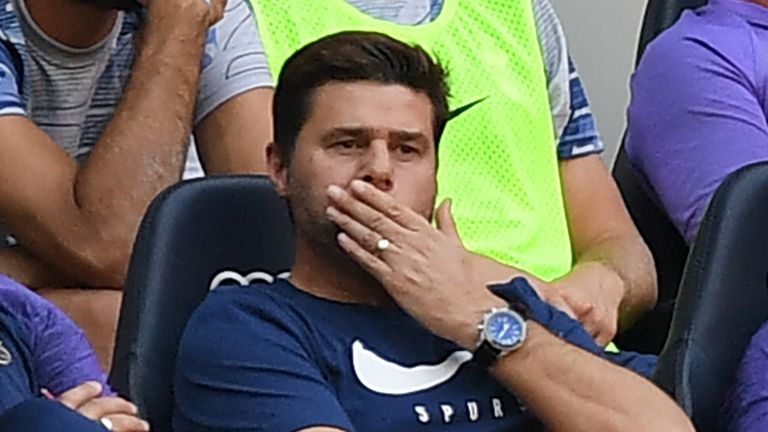 Tottenham Hotspur&#39;s Argentinian head coach Mauricio Pochettino (C) gestures in his seat during the English Premier League football match between Tottenham Hotspur and Newcastle United at Tottenham Hotspur Stadium in London, on August 25, 2019.