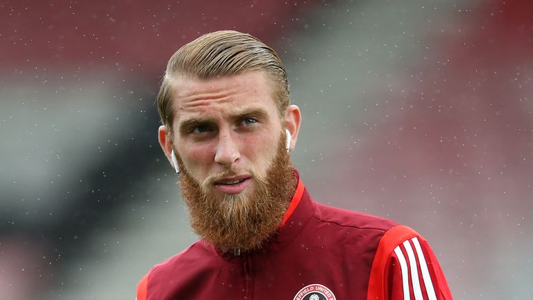 Oli McBurnie arrives ahead of Sheffield United's first game back in the Premier League.