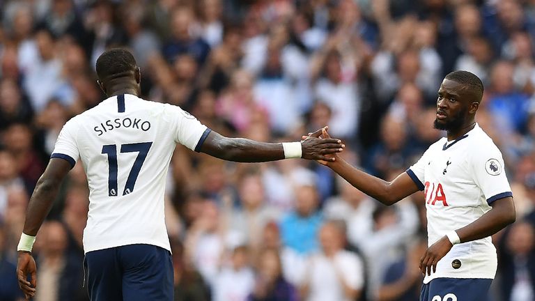 Tottenham Hotspur&#39;s French midfielder Tanguy Ndombele (R) celebrates with Tottenham Hotspur&#39;s French midfielder Moussa Sissoko after scoring the team&#39;s first goal during the English Premier League football match between Tottenham Hotspur and Aston Villa at Tottenham Hotspur Stadium in London, on August 10, 2019