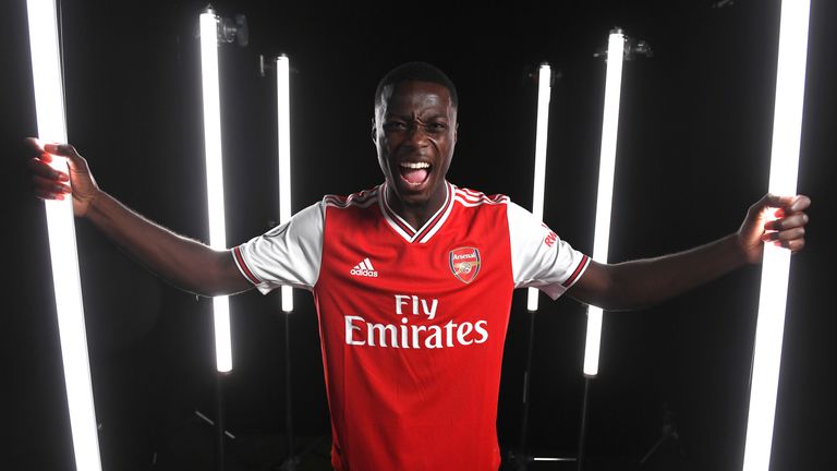 Nicolas Pepe poses during a photoshoot at London Colney