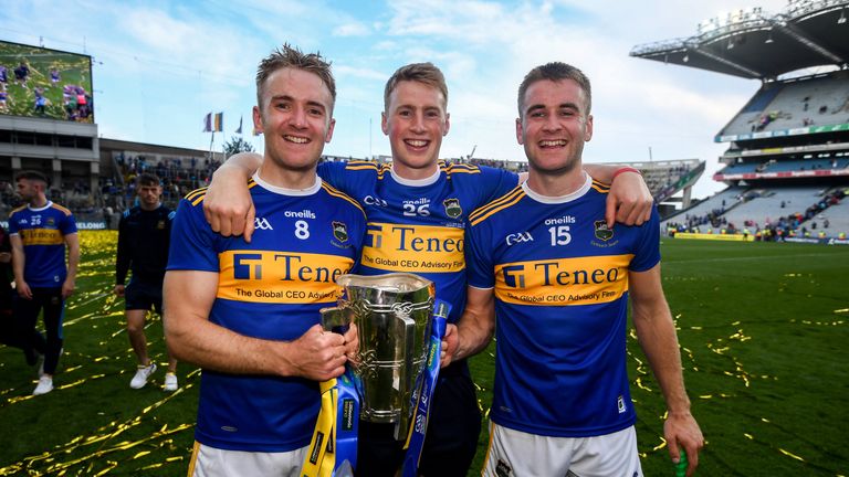 Brothers Noel, Brian and John McGrath celebrate with the Liam MacCarthy Cup last weekend
