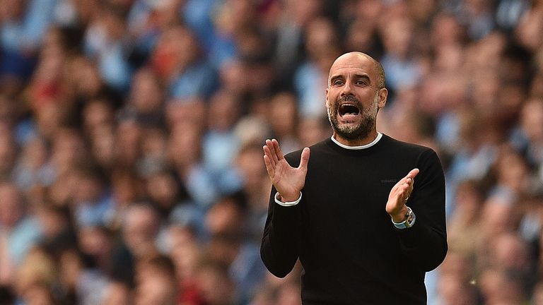 Manchester City&#39;s Spanish manager Pep Guardiola reacts during the English Premier League football match between Manchester City and Tottenham Hotspur at the Etihad Stadium in Manchester, north west England, on August 17, 2019.