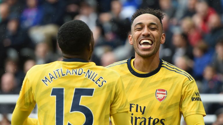 Pierre-Emerick Aubameyang celebrates his goal with teammate Ainsley Maitland-Niles