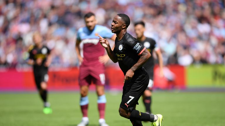Raheem Sterling celebrates after scoring Manchester City&#39;s third goal of the game