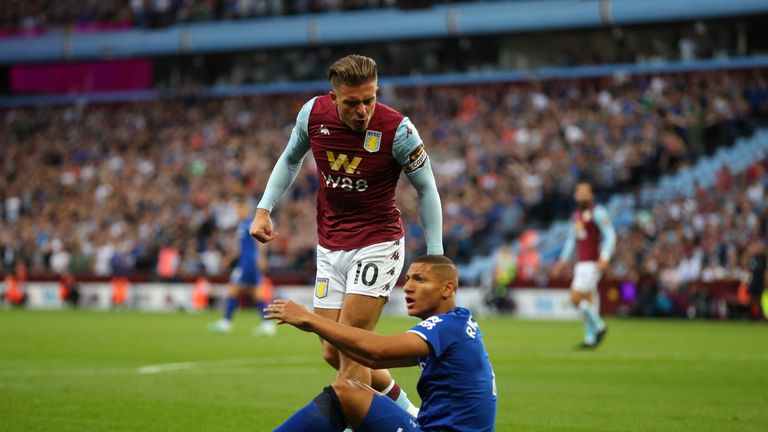 Richarlison appeals for a penalty under a challenge from Jack Grealish