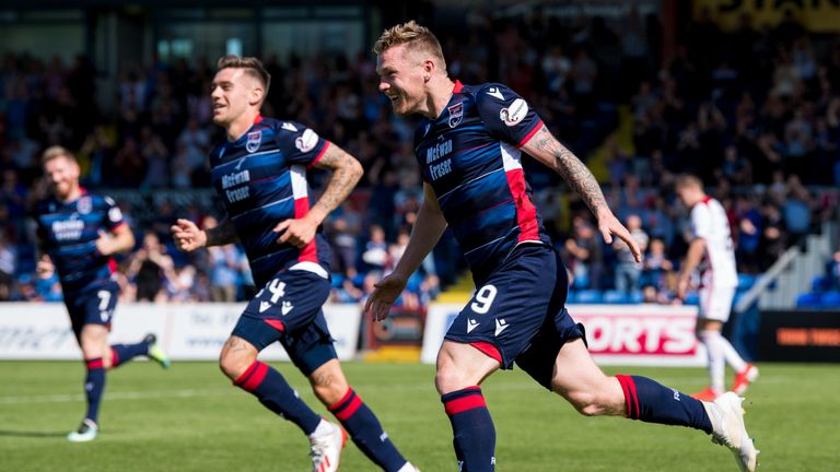 Billy McKay wheels away having made it 2-0 to Ross County