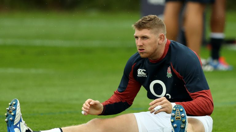 Ruaridh McConnochie stretches during an England training session at Clifton College, Bristol