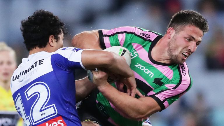 SYDNEY, AUSTRALIA - AUGUST 17: Sam Burgess of the Rabbitohs is tackled during the round 22 NRL match between the South Sydney Rabbitohs and the Canterbury Bulldogs at ANZ Stadium on August 17, 2019 in Sydney, Australia. (Photo by Matt King/Getty Images)