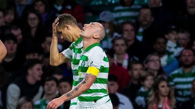 Celtic's Scott Brown is dejected after giving away a handball