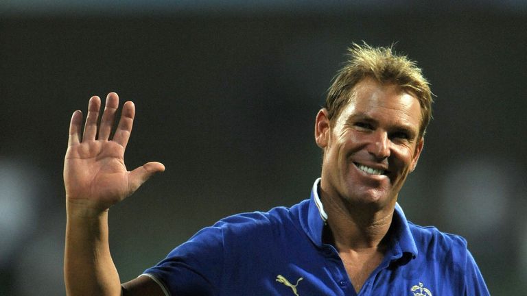 Shane Warne  waves to Rajasthan Royals fans in 2011