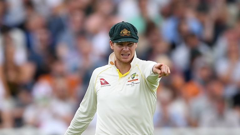 Steve Smith helps set the field on day three at Edgbaston