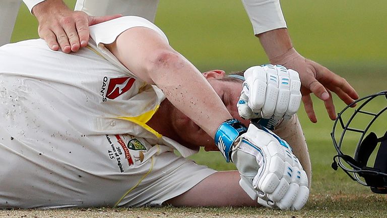 Australia&#39;s Steve Smith lays on the pitch after being hit in the head by a ball off the bowling of England&#39;s Jofra Archer (unseen) during play on the fourth day of the second Ashes cricket Test match between England and Australia at Lord&#39;s Cricket Ground in London on August 17, 2019.