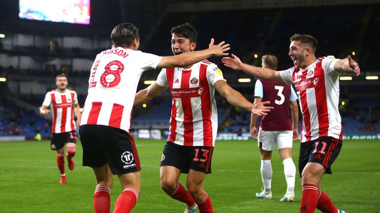 George Dobson of Sunderland AFC celebrates scoring his teams third goal during the Carabao Cup Second Round match between Burnley FC and Sunderland AFC at Turf Moor on August 28, 2019 in Burnley, England. 
