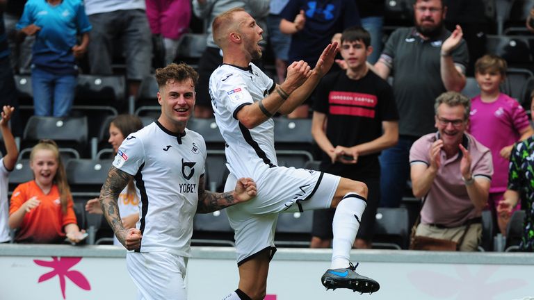 SWANSEA, WALES - AUGUST 03: Mike van der Hoorn of Swansea City celebrates scoring his side's second goal during the Sky Bet Championship match between Swansea City and Hull City at the Liberty Stadium on August 03, 2019 in Swansea, Wales. (Photo by Athena Pictures/Getty Images)