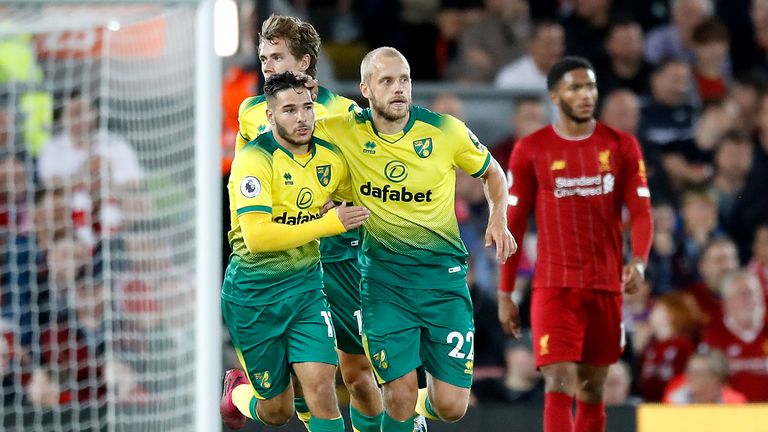 Teemu Pukki (right) celebrates scoring Norwich's goal