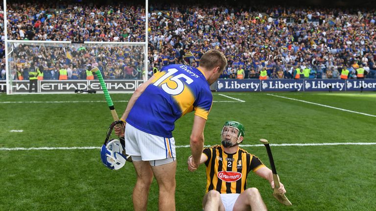 John McGrath shakes hands with Paul Murphy