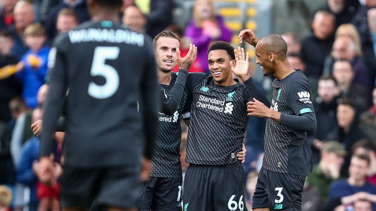 Trent Alexander-Arnold celebrates after making it 1-0