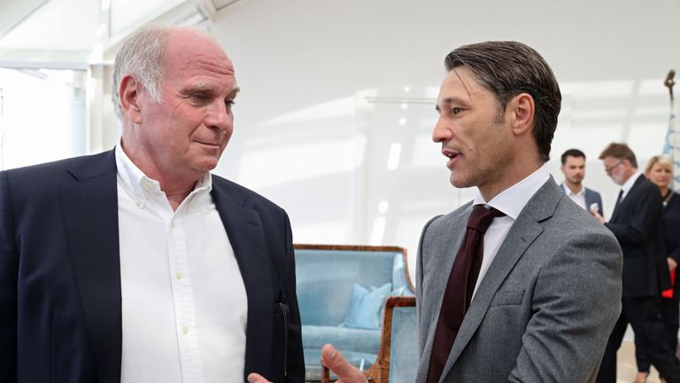 Bayern Munich President Uli Hoeness talking to the club's manager Niko Kovac