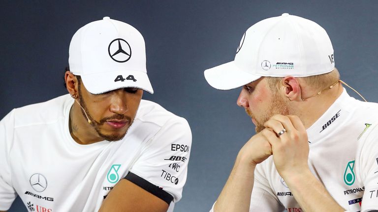 Mercedes&#39; Finnish driver Valtteri Bottas (R) and second-placed Mercedes&#39; British driver Lewis Hamilton attend a press conference after the Formula One Australian Grand Prix in Melbourne on March 17, 2019.