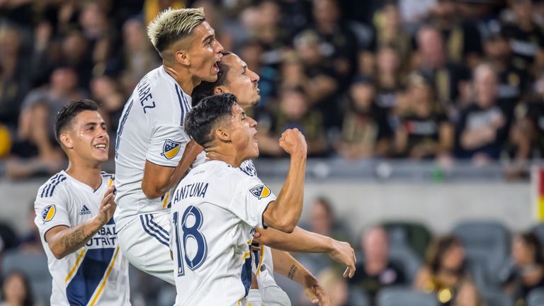 LOS ANGELES, CA - AUGUST 25:  Zlatan Ibrahimovic #9 of Los Angeles Galaxy celebrates his second goal during Los Angeles FC's MLS match against Los Angeles Galaxy at the Banc of California Stadium on August 25, 2019 in Los Angeles, California.  The match ended in a 3-3 draw.  (Photo by Shaun Clark/Getty Images) *** Local Caption *** Zlatan Ibrahimovic