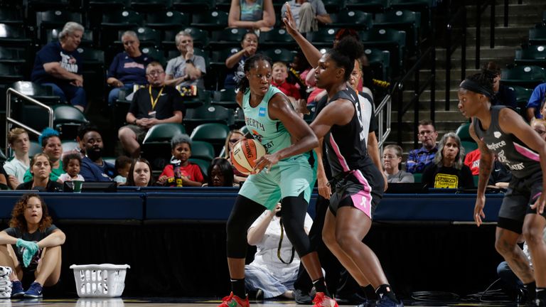 Tina Charles works in the post against the Indiana Fever