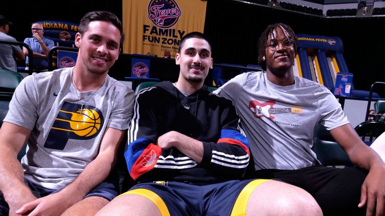 TJ McConnell (left) pictured with Pacers team-mates Goga Bitadze and Myles Turner