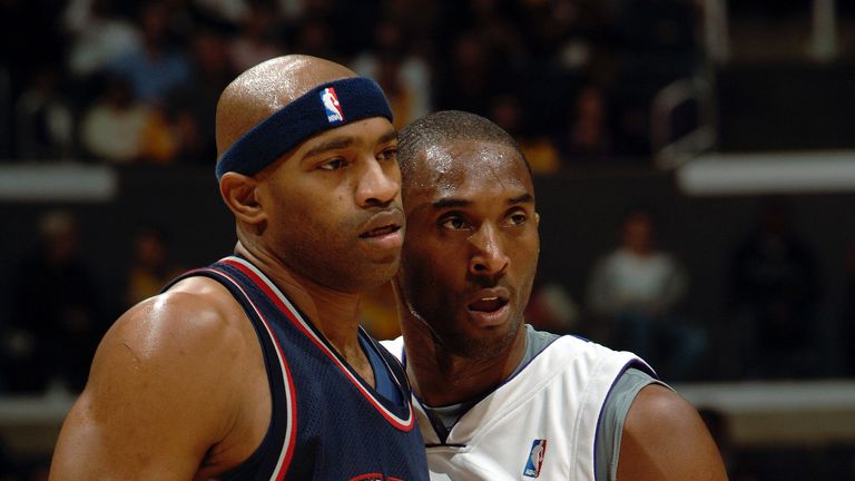 NBA superstars Vince Carter and Kobe Bryant compete in a Nets-Lakers regular-season game in 2005