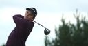 MacIntyre cruises four clear