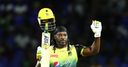 Gayle blasts ton as records