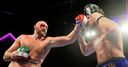 Fury survives cut to stay unbeaten