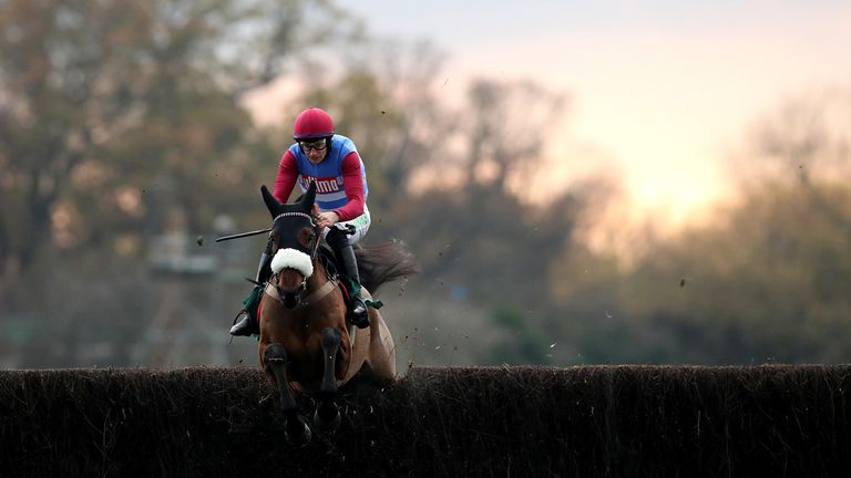 Djingle ridden by A.P. Heskin on the first circuit round in the Highflyer Bloodstock Novices... Chase at Warwick Racecourse.