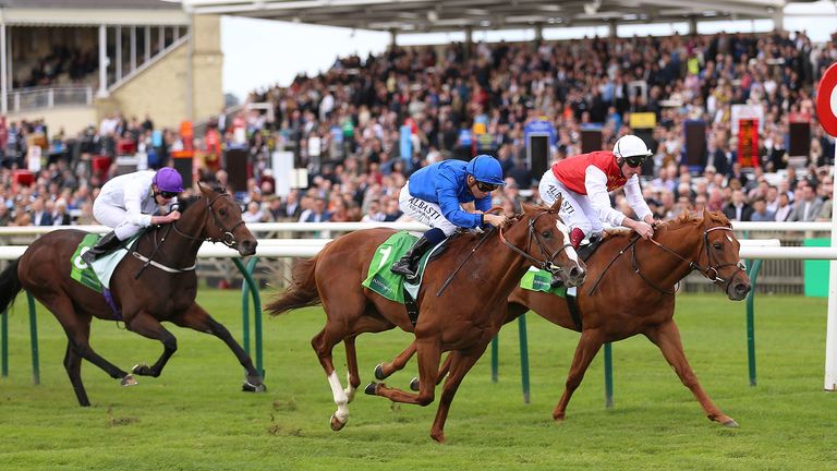Earthlight (centre) ridden by Mickael Barzalona wins The Juddmonte Middle Park Stakes ahead of Golden Horde (right) ridden by Adam Kirby during day three of The Cambridgeshire Meeting at Newmarket Racecourse. PA Photo. Picture date: Saturday September 28, 2019. See PA story RACING Newmarket. Photo credit should read: Nigel French/PA Wire.
