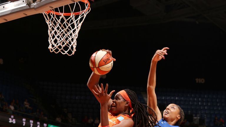 Jonquel Jones of the Connecticut Sun rebounds the ball against the Dallas Wings 