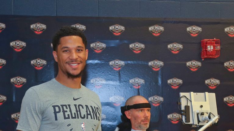 Josh Hart pictures at a Pelicans community event