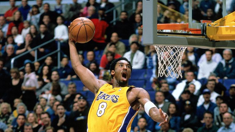 Kobe Bryant soars for a dunk