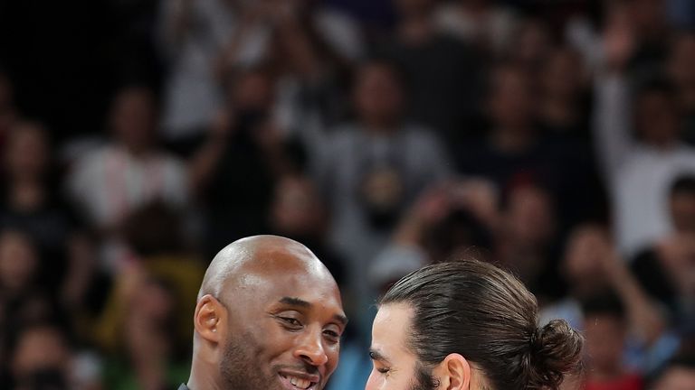 Kobe Bryant congratulates Ricky Rubio following Spain triumph at the FIBA World Cup