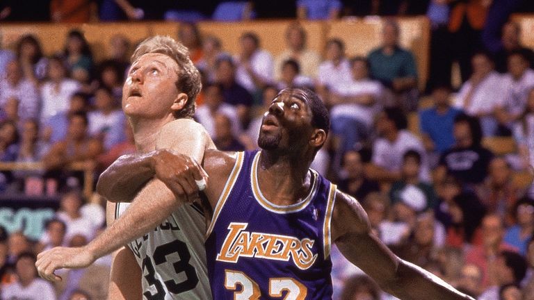 Larry Bird and Magic Johnson compete for a rebound in the 1987 NBA Finals