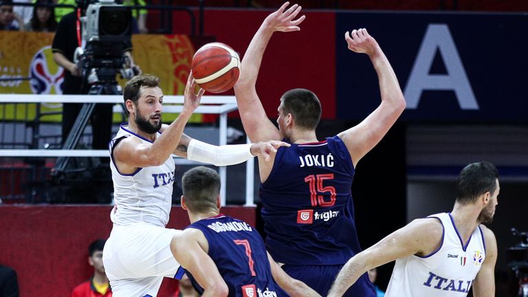 Marco Bellinelli tries to evade the defensive attentions of Nikola Jokic at the FIBA World Cup