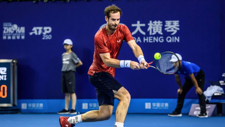 Andy Murray of Britain hits a return against Alex de Minaur of Australia during their men's singles second round match at the Zhuhai Championships tennis tournament in Zhuhai in China's southern Guangdong province on September 26, 2019.
