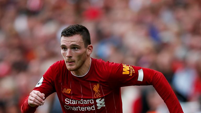 Liverpool&#39;s Andy Robertson in action against Newcastle