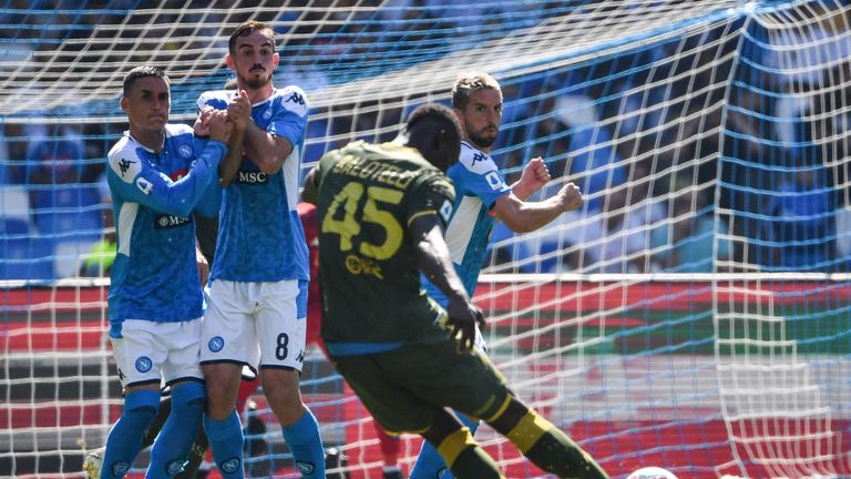 Balotelli lets fly from a free-kick during Sunday's 2-1 defeat at Napoli
