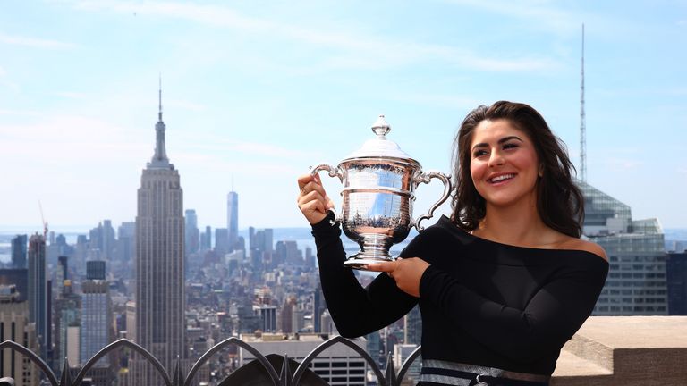 Bianca Andreescu of Canada poses with her trophy at the Top of the Rock in Rockefeller Center on September 8, 2019 in New York City. 