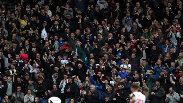 Bolton fans celebrate the opening goal