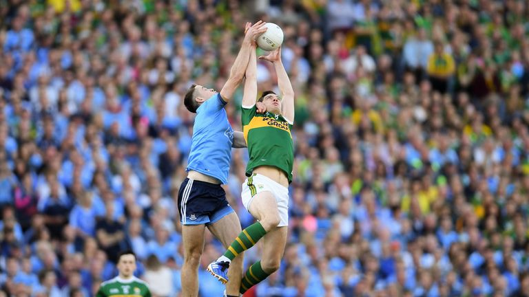 Brian Fenton and David Moran compete for possession